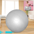Woman performing Pilates exercises on a 75CM stability gym ball