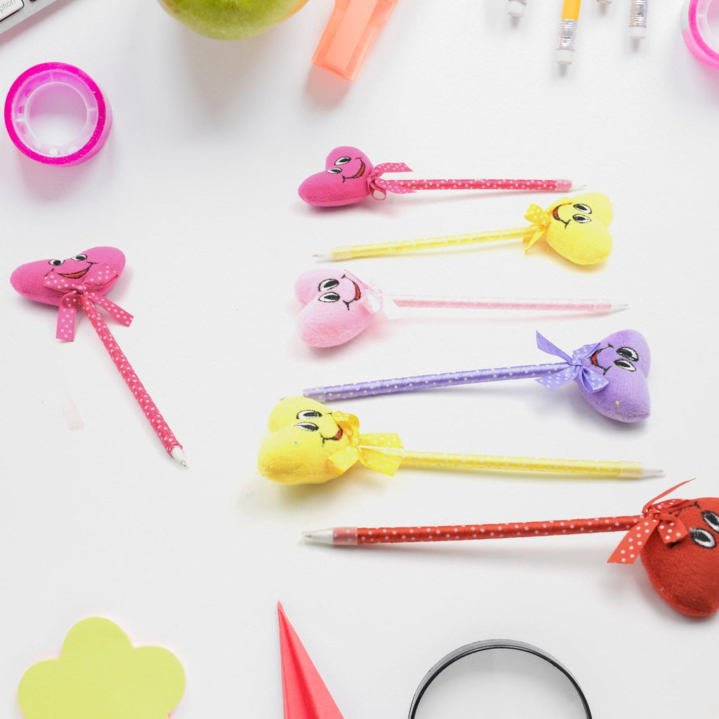 A mix of colorful cartoon and heart design pens