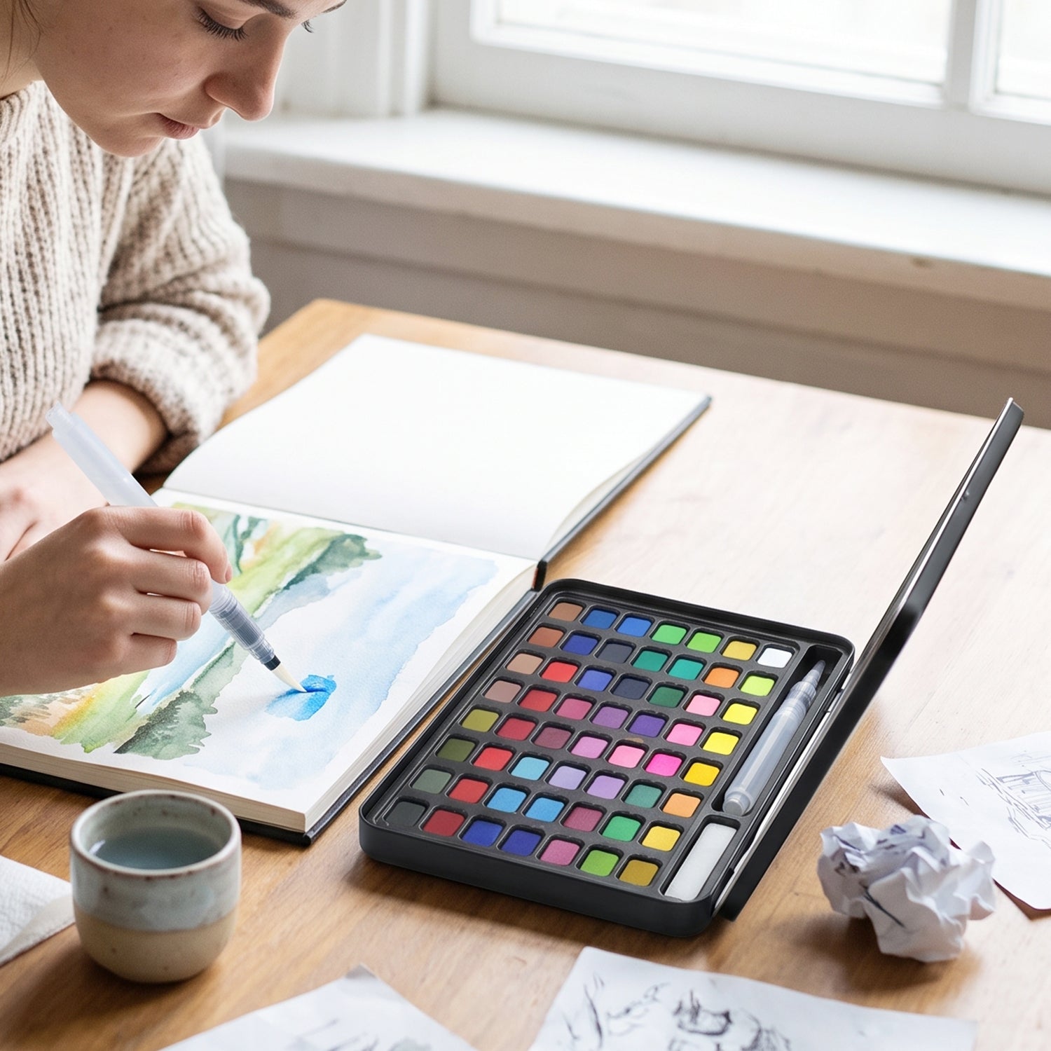 Watercolor palette used in a sketchbook painting session