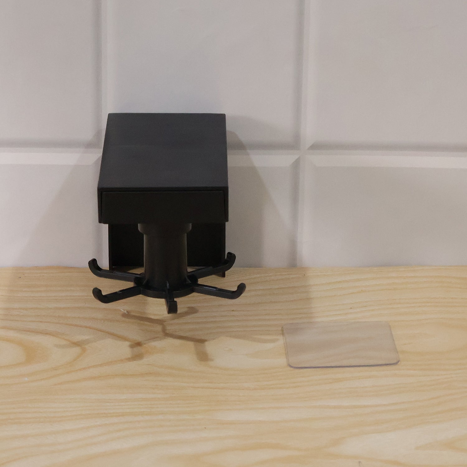 Live photo of rotating hanging hook with adhesive pad