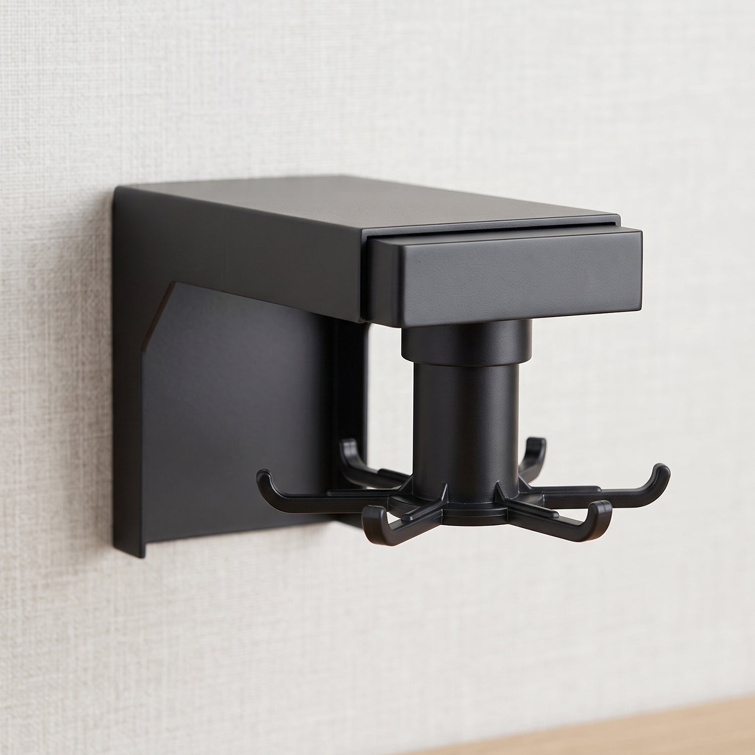 Rotating hanging hook mounted on wall