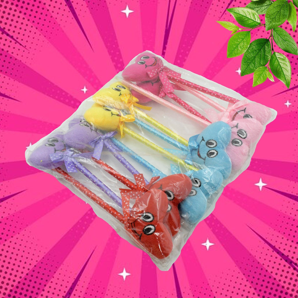 Close-up of individual cartoon and heart pens with rattles