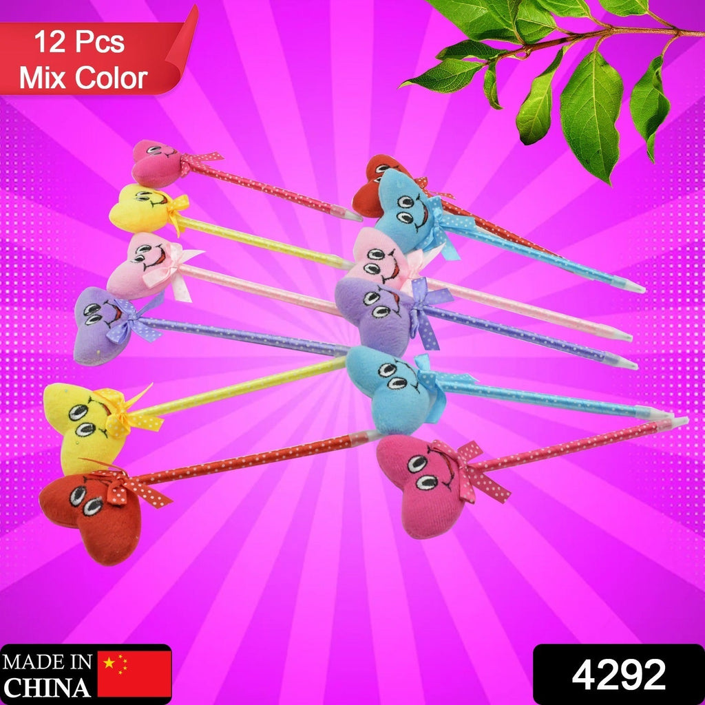 Multiple cartoon and heart design pens displayed on a table