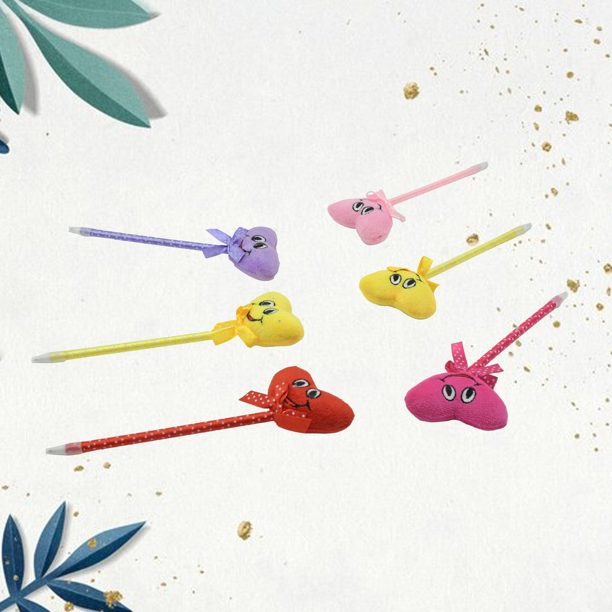 Group of cartoon and heart pens with rattles in various colors
