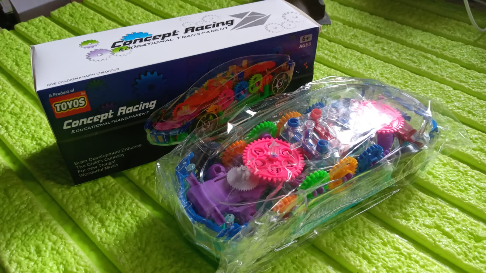 Box packaging of rotating transparent gear car toy