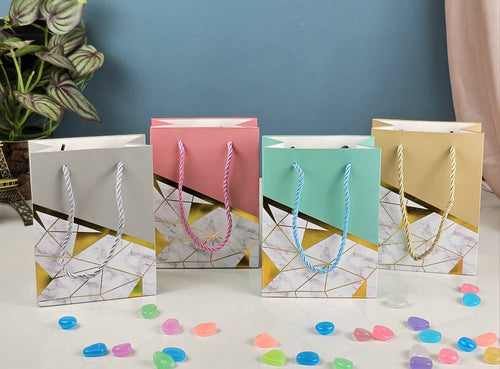 (Random Colour) Multicolor Paper Bag With Handle To Carry Goodies Used For Gifts Carrying Return Gift For Birthdays & More Occassion (Mix Colour) - Image 1