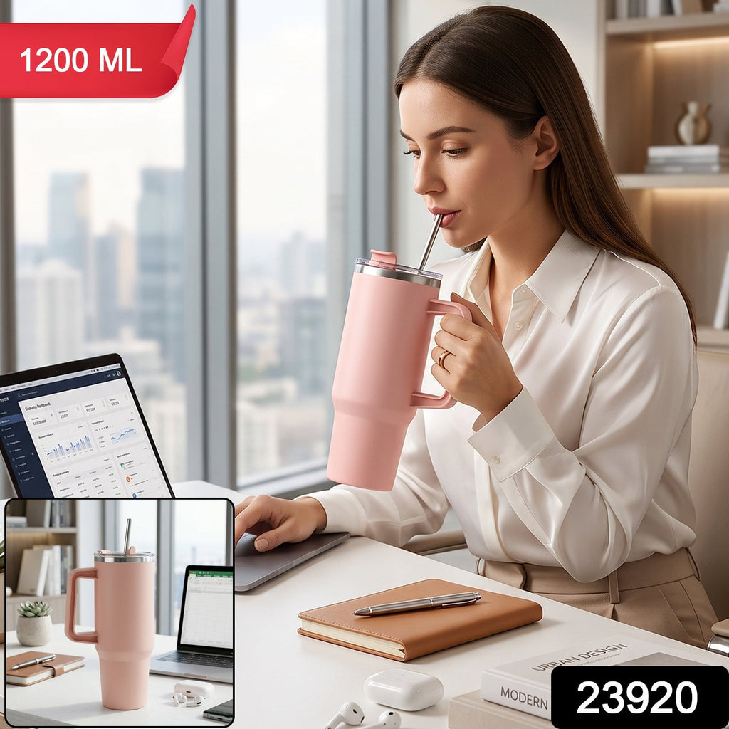 Pink stainless steel tumbler with carry handle and straw
